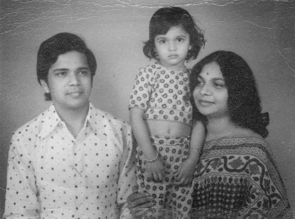 Smriti as a child with her parents